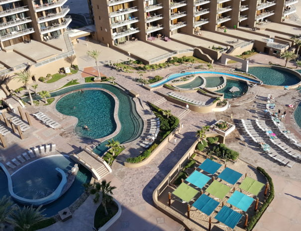 Great balcony views of the 4 diamond resort pools, lazy river, hammock area and spa!