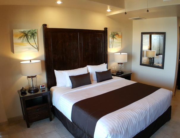 Master Suite with ocean views, king bed, private ensuite bathroom and direct balcony access.