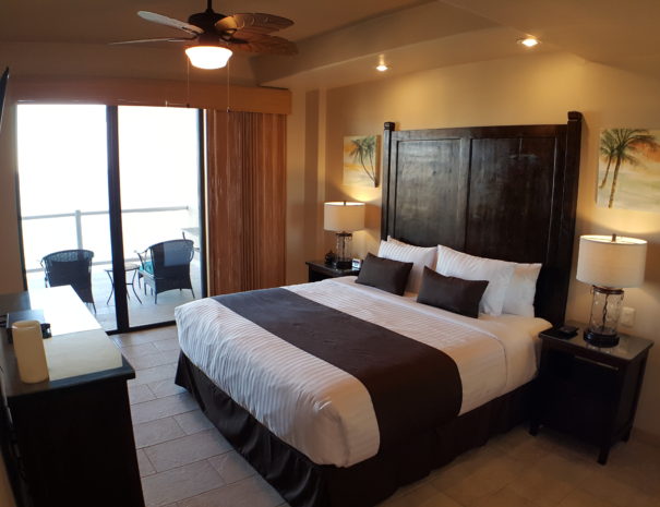 Master Suite with ocean views, king bed, private ensuite bathroom and direct balcony access.