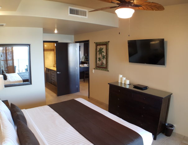 Master Suite with ocean views, king bed, private ensuite bathroom and direct balcony access.