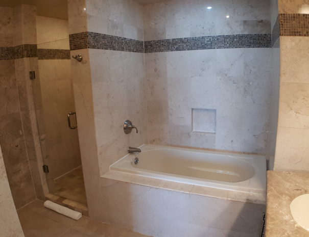 Large soaking tub with custom tile.